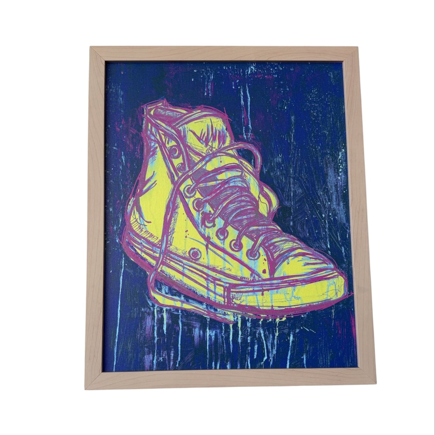 Framed artwork of a yellow high-top sneaker on a dark blue background