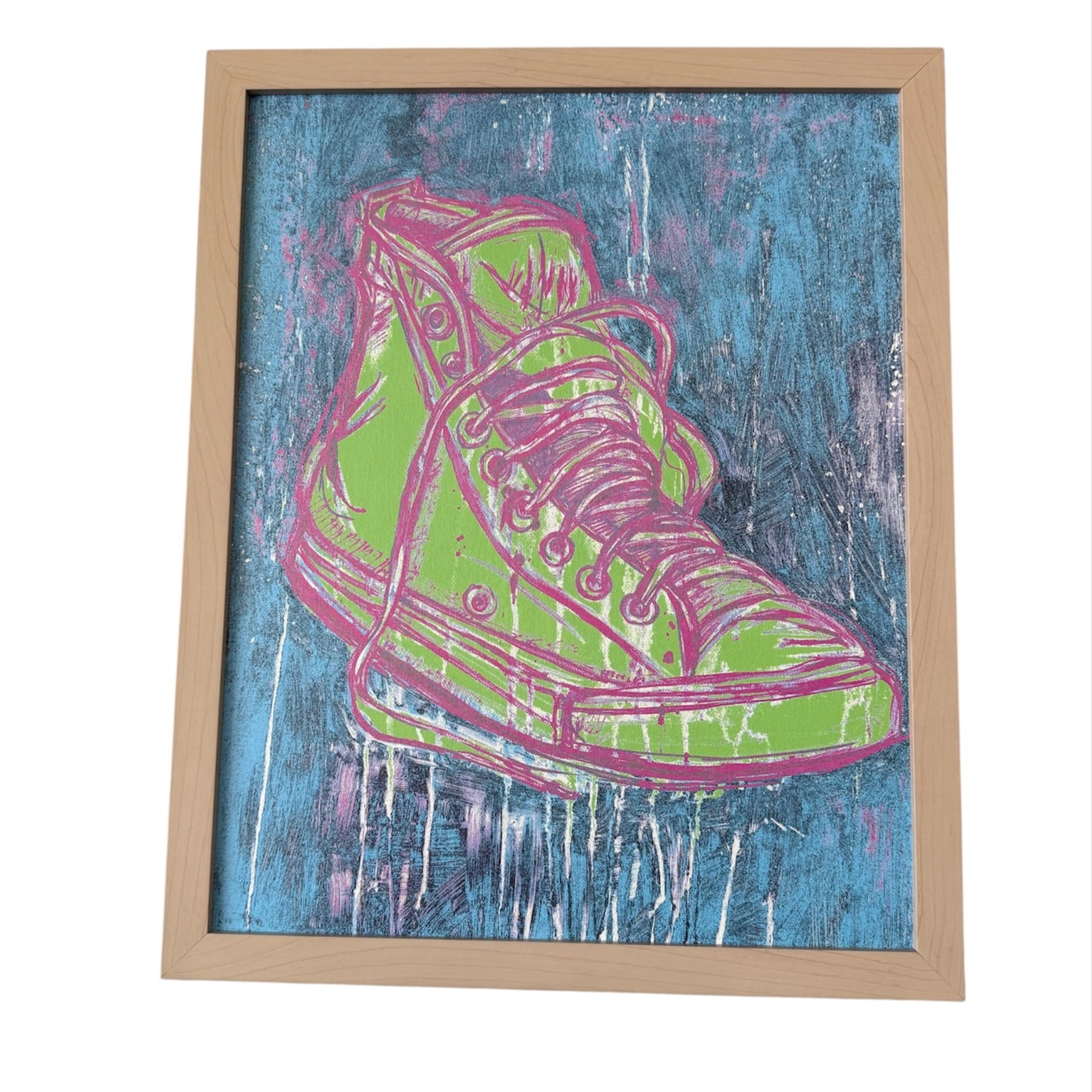 Framed artwork of a green and pink high-top sneaker on a blue textured background