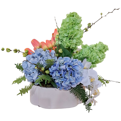 Custom Spring Arrangement in White Planter